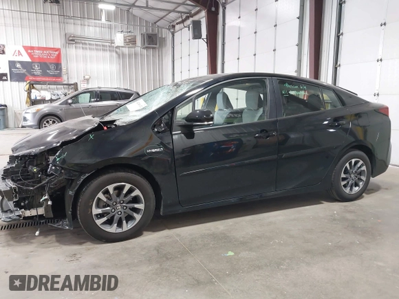 2022 Toyota Prius L Eco with VIN JTDKAMFU2N3186072, listed as a IAAI auction lot 42486252 with 5,887 mi miles and . Bid and sale history available at DreamBid. Image 14.