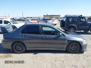 2006 Mitsubishi Lancer Evolution IX с VIN JA3AH86C56U016823, выставлен на аукционе IAAI как лот 42298601 с пробегом 144 171 миль миль и . История ставок и продаж доступна на DreamBid. Изображение 13.