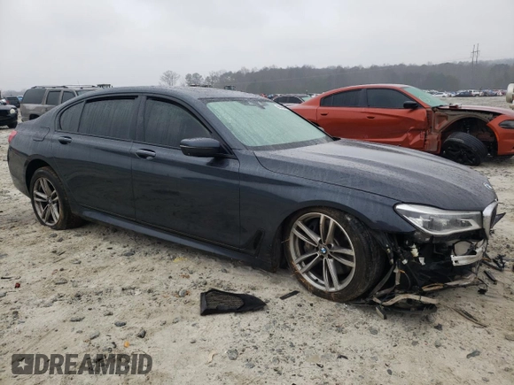 2016 BMW 7 Series 750i xDrive with VIN WBA7F2C54GG415272, listed as a Copart auction lot 86573664 with Not provided miles and Salvage title. Bid and sale history available at DreamBid. Image 4.
