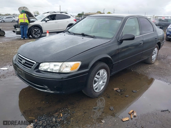 2000 Toyota Camry CE with VIN JT2BG22KXY0432288, listed as a IAAI auction lot 41927856 with 203,035 mi miles. Bid and sale history available at carsss.com. Image 2.