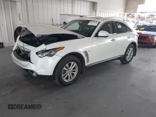 2015 Infiniti QX70 z VIN JN8CS1MU9FM380276, wystawiony jako IAAI lot #42356021 z przebiegiem 98 589 mil mil oraz . Historia ofert i sprzedaży dostępna na DreamBid. Obrazek 2.
