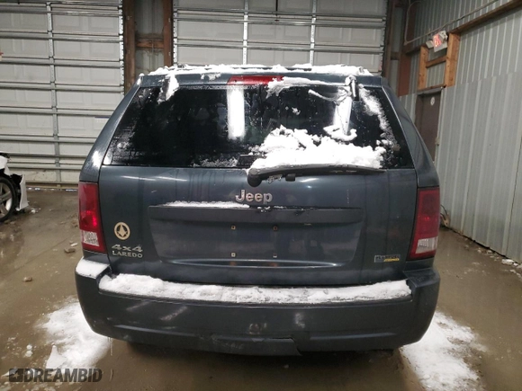 2007 Jeep Grand Cherokee Laredo with VIN 1J8HR48P17C698847, listed as a Copart auction lot 87589575 with 183,188 mi miles and Salvage Title. Bid and sale history available at carsss.com. Image 6.