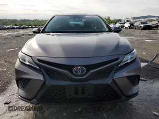 2019 Toyota Camry Hybrid LE z VIN 4T1B21HKXKU518106, wystawiony jako Copart lot #77074883 z przebiegiem 147 442 mil mil oraz Szkoda całkowita • Salvage title. Historia ofert i sprzedaży dostępna na DreamBid. Obrazek 5.