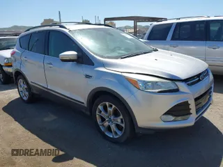 2013 Ford Escape SEL with VIN 1FMCU9HXXDUC17184, listed as a IAAI auction lot 42088020 with 63,151 mi miles. Bid and sale history available at carsss.com. Image 1.