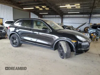 2012 Porsche Cayenne S Hybrid z VIN WP1AE2A28CLA93269, wystawiony jako Copart lot #45205745 z przebiegiem 72 949 mil mil oraz Szkody całkowita. Historia ofert i sprzedaży dostępna na DreamBid. Obrazek 4.