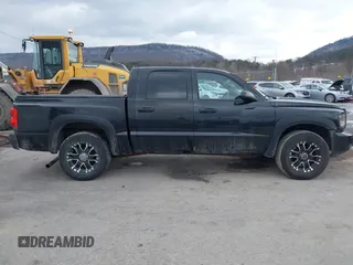 2011 Ram Dakota Bighorn/Lonestar with VIN 1D7RW3GK6BS611095, listed as a IAAI auction lot 41433067 with 137,638 mi miles. Bid and sale history available at carsss.com. Image 13.