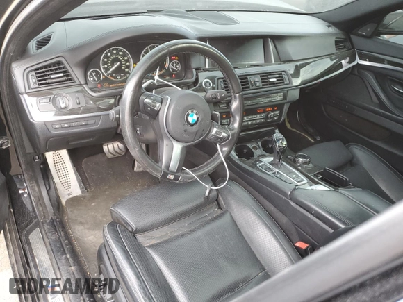2016 BMW 5 Series 550i xDrive with VIN WBAKP9C52GG587512, listed as a Copart auction lot 87048184 with 95,493 mi miles and Clean title. Bid and sale history available at DreamBid. Image 8.
