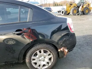 2009 Nissan Sentra SL с VIN 3N1AB61E19L615820, выставлен на аукционе Copart как лот 85438404 с пробегом 217 369 миль миль и Списание • Salvage title. История ставок и продаж доступна на DreamBid. Изображение 11.