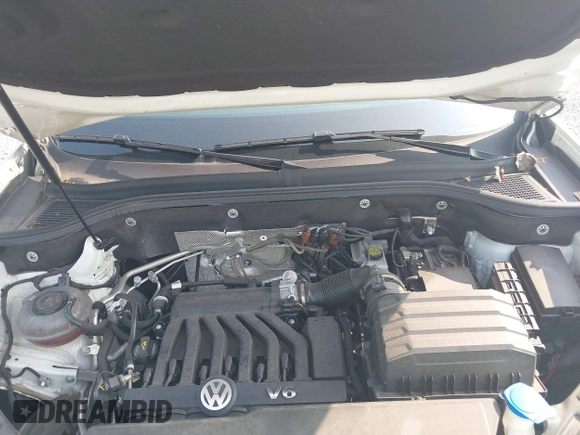 2023 Volkswagen Atlas SE z VIN 1V2WR2CA6PC547040, wystawiony jako IAAI lot #42400535 z przebiegiem 25 300 mil mil oraz . Historia ofert i sprzedaży dostępna na DreamBid. Obrazek 10.