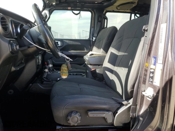 2020 Jeep Wrangler Unlimited Willys with VIN 1C4HJXDG5LW246978, listed as a Copart auction lot 52930515 with 117,020 mi miles and Salvage title. Bid and sale history available at DreamBid. Image 7.