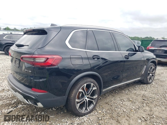 2020 BMW X5 sDrive40i with VIN 5UXCR4C0XLLW63728, listed as a Copart auction lot 56112475 with 65,704 mi miles and Clean title. Bid and sale history available at DreamBid. Image 3.