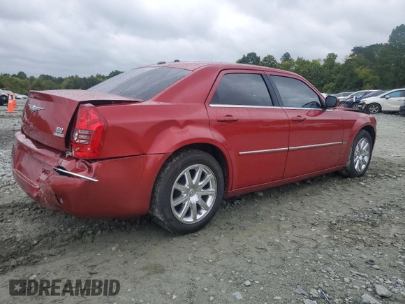 2009 Chrysler 300 Touring with VIN 2C3KA53V99H617274, listed as a Copart auction lot 71791144 with 123,045 mi miles and Salvage Title. Bid and sale history available at carsss.com. Image 3.