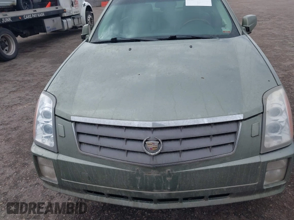 2004 Cadillac SRX with VIN 1GYDE63A340128713, listed as a IAAI auction lot 41788552 with 158,606 mi miles. Bid and sale history available at carsss.com. Image 6.