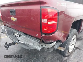 2014 Chevrolet Silverado 1500 LT with VIN 1GCVKRECXEZ296266, listed as a IAAI auction lot 41606586 with 233,832 mi miles and . Bid and sale history available at DreamBid. Image 6.