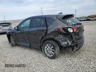 2016 Mazda CX-5 Touring with VIN JM3KE2CY8G0902131, listed as a Copart auction lot 53354745 with 123,474 mi miles and Salvage Title. Bid and sale history available at carsss.com. Image 2.