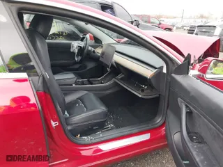 2018 Tesla Model 3 Long Range Battery with VIN 5YJ3E1EA4JF159743, listed as a IAAI auction lot 40839991 with 117,039 mi miles. Bid and sale history available at carsss.com. Image 5.
