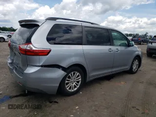 2015 Toyota Sienna XLE with VIN 5TDYK3DC0FS592251, listed as a Copart auction lot 60126165 with 118,925 mi miles and Salvage title. Bid and sale history available at DreamBid. Image 3.