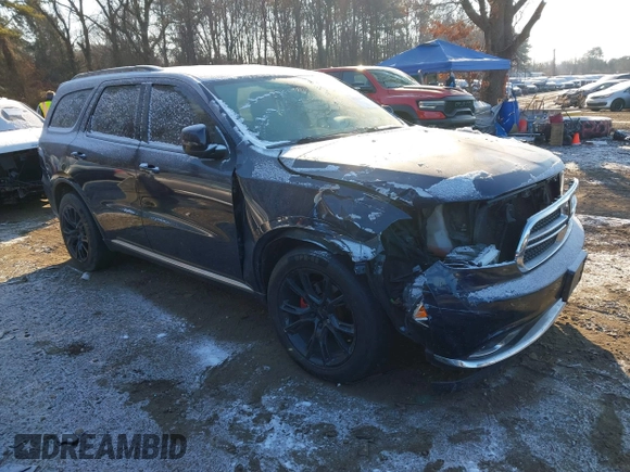 2014 Dodge Durango SXT with VIN 1C4RDHAG5EC369951, listed as a IAAI auction lot 41278358 with 214,453 mi miles and . Bid and sale history available at carsss.com. Image 1.