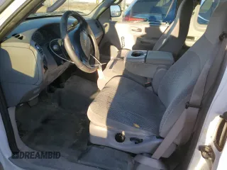 2000 Ford F-150 with VIN 1FTRX17W8YKB11043, listed as a Copart auction lot 77390664 with 181,439 mi miles and Salvage Title. Bid and sale history available at DreamBid. Image 7.