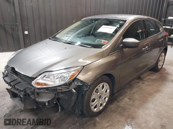 2012 Ford Focus SE with VIN 1FAHP3K22CL394088, listed as a IAAI auction lot 40953085 with 147,259 mi miles and . Bid and sale history available at carsss.com. Image 2.