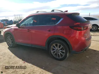 2020 Mazda CX-5 Grand Touring with VIN JM3KFBDM9L1820907, listed as a Copart auction lot 86166054 with 34,007 mi miles and Salvage Title. Bid and sale history available at carsss.com. Image 2.