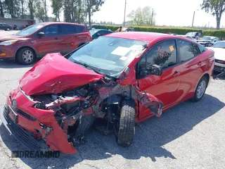2020 Toyota Prius L Eco z VIN JTDKARFU0L3109596, wystawiony jako IAAI lot #41950366 z przebiegiem Nie podano mil oraz . Historia ofert i sprzedaży dostępna na DreamBid. Obrazek 18.