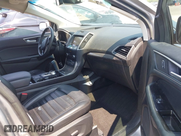 2020 Ford Edge SEL with VIN 2FMPK3J98LBA83828, listed as a IAAI auction lot 42585669 with 60,704 mi miles and . Bid and sale history available at DreamBid. Image 5.