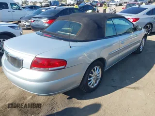 2002 Chrysler Sebring Limited with VIN 1C3EL65R72N233892, listed as a IAAI auction lot 41338296 with 120,875 mi miles and . Bid and sale history available at DreamBid. Image 4.