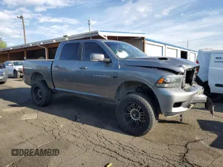 2012 Ram 1500 Sport with VIN 1C6RD7MT8CS150205, listed as a Copart auction lot 56344105 with 145,400 mi miles and Salvage title. Bid and sale history available at DreamBid. Image 4.