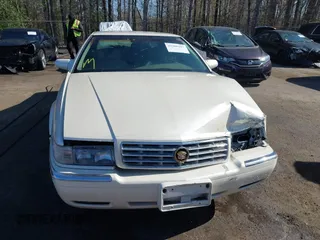 2000 Cadillac Eldorado ESC with VIN 1G6EL12Y0YB702778, listed as a IAAI auction lot 41988107 with 203,526 mi miles. Bid and sale history available at carsss.com. Image 12.