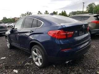 2016 BMW X4 xDrive28i with VIN 5UXXW3C50G0R22203, listed as a Copart auction lot 58575493 with 106,956 mi miles. Bid and sale history available at carsss.com. Image 2.
