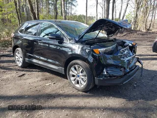 2022 Ford Edge Titanium z VIN 2FMPK4K95NBB06151, wystawiony jako IAAI lot #41932545 z przebiegiem 57 762 mil mil oraz . Historia ofert i sprzedaży dostępna na DreamBid. Obrazek 1.