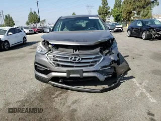 2017 Hyundai Santa Fe 2.4L with VIN 5XYZT3LB0HG392609, listed as a Copart auction lot 62553505 with 69,774 mi miles and Salvage title. Bid and sale history available at DreamBid. Image 14.