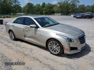 2016 Cadillac CTS Luxury Collection RWD with VIN 1G6AR5SX9G0113699, listed as a Copart auction lot 52864495 with 30,860 mi miles and Salvage Title. Bid and sale history available at DreamBid. Image 4.