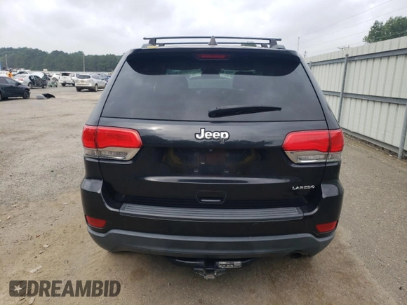 2016 Jeep Grand Cherokee Laredo with VIN 1C4RJEAG4GC394091, listed as a Copart auction lot 56595165 with 134,135 mi miles and Salvage title. Bid and sale history available at DreamBid. Image 6.