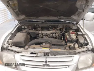 2002 Mitsubishi Montero Limited z VIN JA4MW51RX2J048087, wystawiony jako IAAI lot #42096678 z przebiegiem 218 795 mil mil oraz . Historia ofert i sprzedaży dostępna na DreamBid. Obrazek 10.