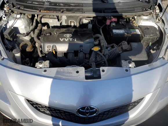 2009 Toyota Yaris with VIN JTDBT903994041702, listed as a Copart auction lot 86693314 with 136,317 mi miles and Salvage Title. Bid and sale history available at carsss.com. Image 11.