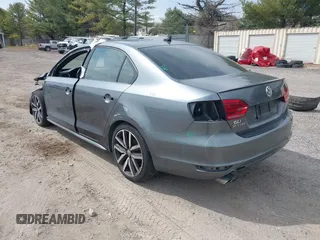 2013 Volkswagen Jetta Autobahn with VIN 3VW4T7AJ7DM451077, listed as a IAAI auction lot 41855053 with 75,207 mi miles and . Bid and sale history available at DreamBid. Image 3.