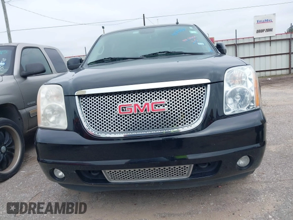 2009 GMC Yukon SLT w/4SA with VIN 1GKFC33J39R295065, listed as a IAAI auction lot 41514132 with 216,680 mi miles. Bid and sale history available at carsss.com. Image 12.