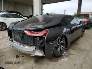 2015 BMW i8 z VIN WBY2Z2C54FV392511, wystawiony jako Copart lot #53033563 z przebiegiem 51 024 mil mil oraz . Historia ofert i sprzedaży dostępna na DreamBid. Obrazek 3.