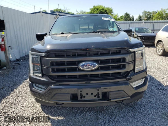 2021 Ford F-150 XL with VIN 1FTFW1E81MFA80456, listed as a Copart auction lot 61268545 with 57,233 mi miles and Salvage title. Bid and sale history available at DreamBid. Image 5.