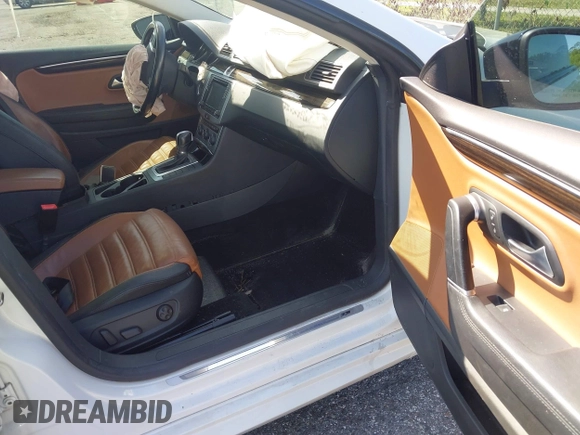 2017 Volkswagen CC R-Line Executive with VIN WVWFP7AN7HE502219, listed as a IAAI auction lot 41947387 with 96,738 mi miles and . Bid and sale history available at DreamBid. Image 5.