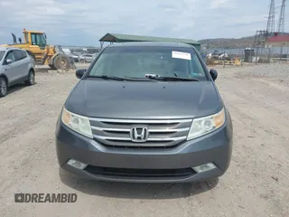 2012 Honda Odyssey Touring with VIN 5FNRL5H90CB045430, listed as a IAAI auction lot 42079770 with 113,901 mi miles and . Bid and sale history available at DreamBid. Image 13.