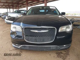 2016 Chrysler 300 Anniversary Edition with VIN 2C3CCAAG4GH141217, listed as a IAAI auction lot 42121809 with 74,739 mi miles and . Bid and sale history available at DreamBid. Image 13.