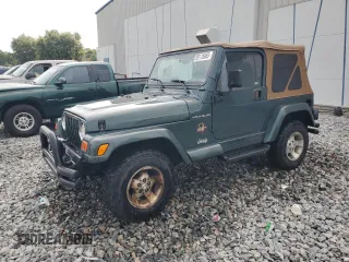 2002 Jeep Wrangler Sahara с VIN 1J4FA59S52P763290, выставлен на аукционе Copart как лот 59115665 с пробегом 129 479 миль миль и На запчасти • Non repairable. История ставок и продаж доступна на DreamBid. Изображение 1.