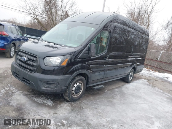 2020 Ford Transit Cargo with VIN 1FTBR3XG1LKB79029, listed as a IAAI auction lot 41483908 with 147,801 mi miles and . Bid and sale history available at DreamBid. Image 2.