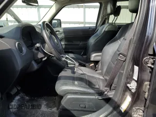 2016 Jeep Patriot High Altitude Edition with VIN 1C4NJRFB5GD585998, listed as a Copart auction lot 49702445 with 86,255 mi miles and Salvage Title. Bid and sale history available at carsss.com. Image 7.