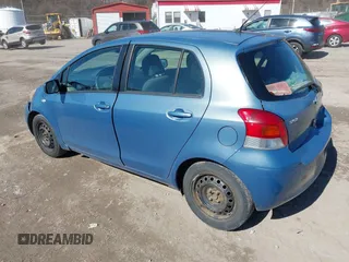 2010 Toyota Yaris with VIN JTDKT4K3XA5282294, listed as a IAAI auction lot 41856423 with 264,409 mi miles. Bid and sale history available at carsss.com. Image 3.