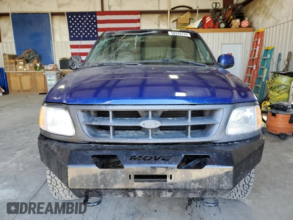 1997 Ford F-150 z VIN 1FTDF18W0VLB11829, wystawiony jako Copart lot #69103414 z przebiegiem 291 277 mil mil oraz Czysty tytuł • Clean title. Historia ofert i sprzedaży dostępna na DreamBid. Obrazek 5.