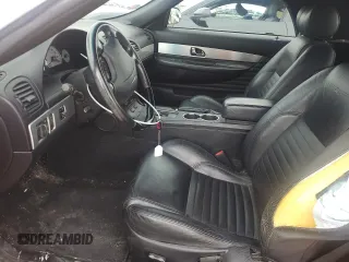 2003 Ford Thunderbird Deluxe with VIN 1FAHP60A23Y106875, listed as a Copart auction lot 87507095 with Not Provided miles and Salvage Title. Bid and sale history available at DreamBid. Image 7.